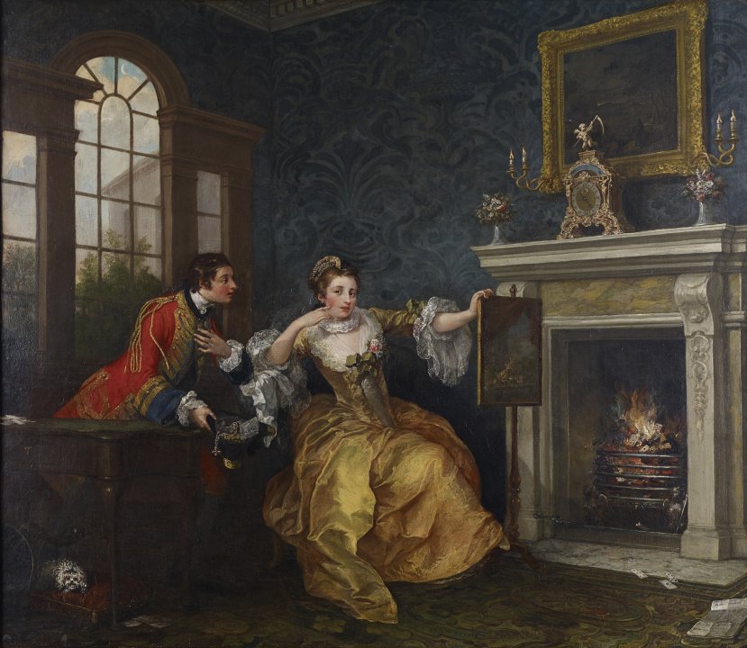 In a well furnished room, an aristocratic white woman dressed in a dramatic yellow dress sits near a fire, with her hand on a decorative painting on a stand and her other hand against her face as she listens to a soldier in a red uniform speak to her closely. There is also a white dog hidden under a table  
