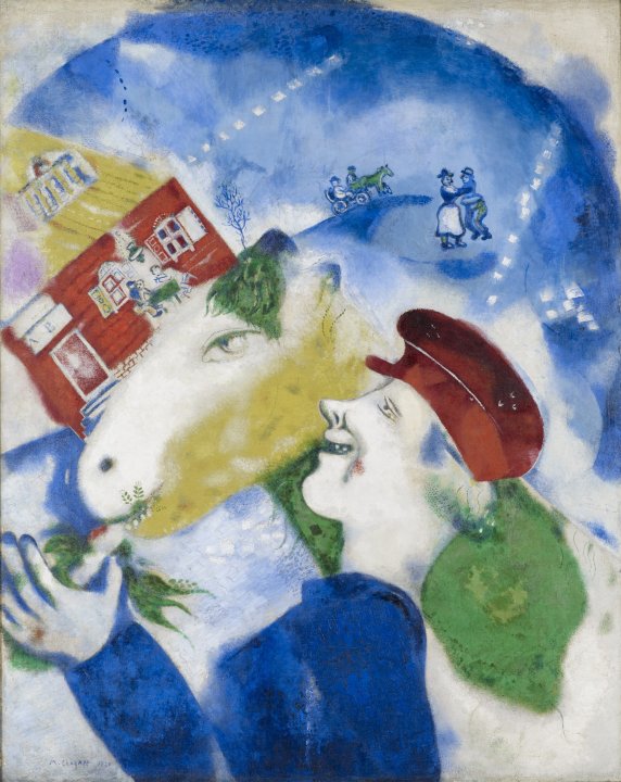 IN vibrant colors, a white man in blue and a red hate is feeding a white and yellow horse carrots with a blue circle in the background where a red house and yellow roof and a couple dancing are in the blue circle