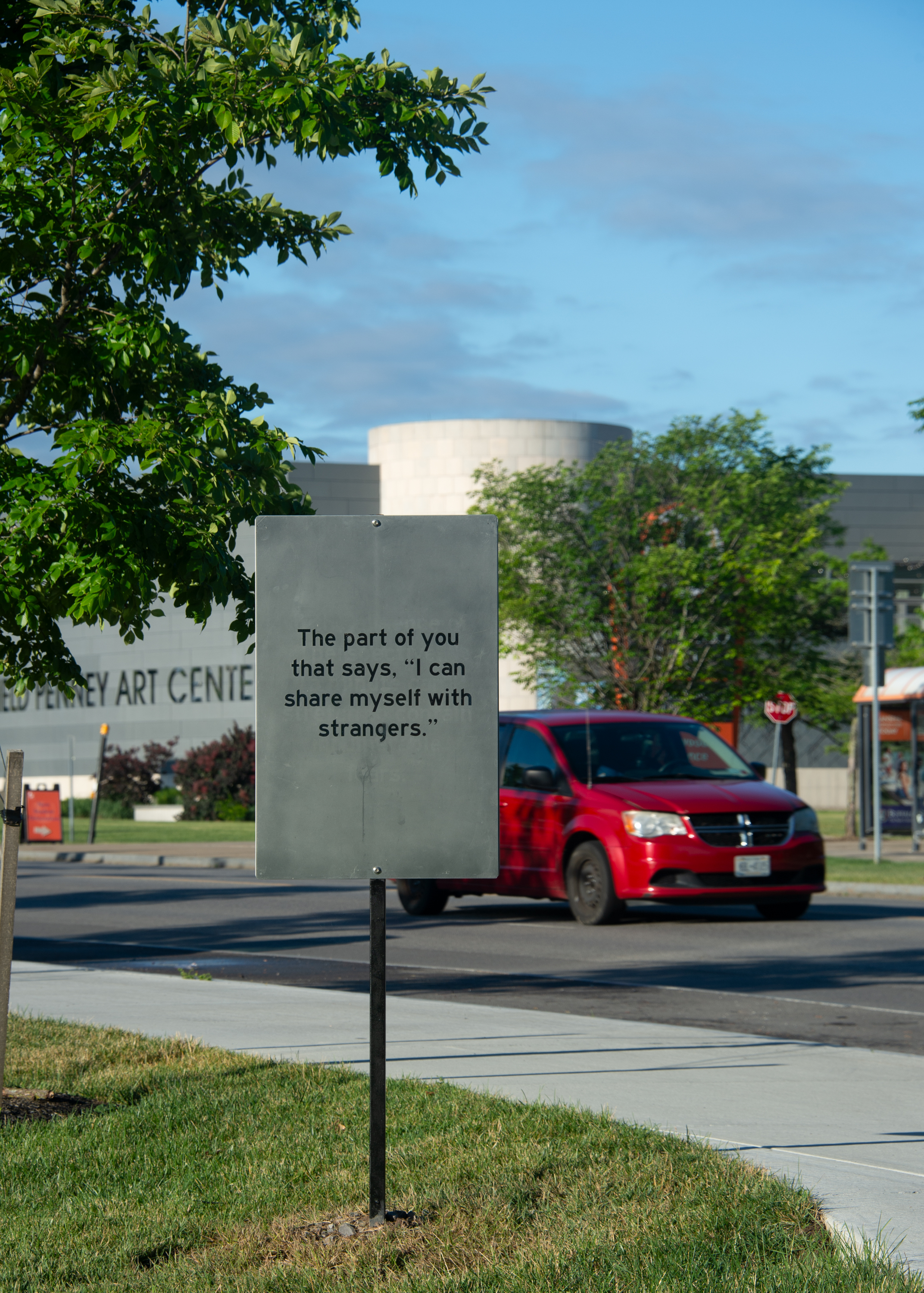 A frosted sign that reads 'The part of you that says, “I can share myself with strangers.”'