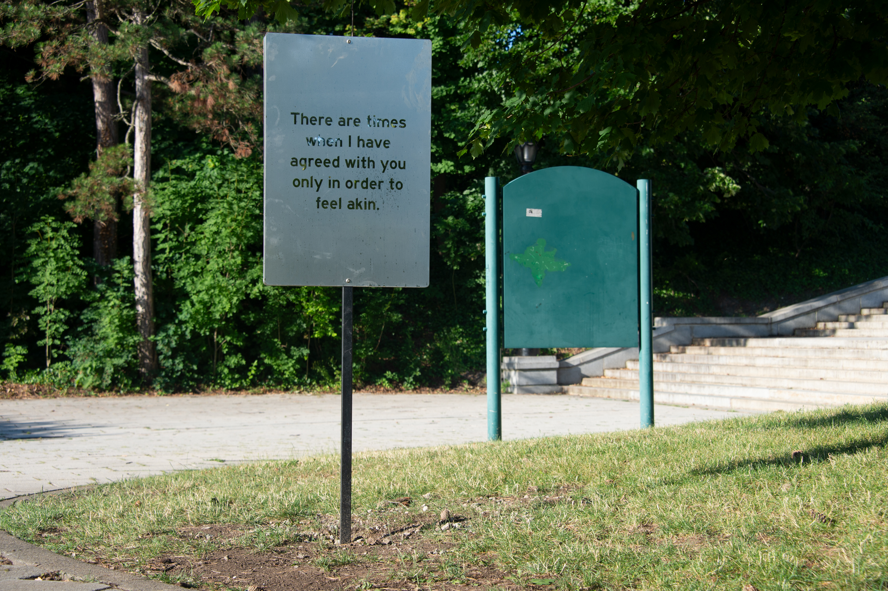 A sign that reads "There are times when I have agreed with you only in order to feel akin. " 