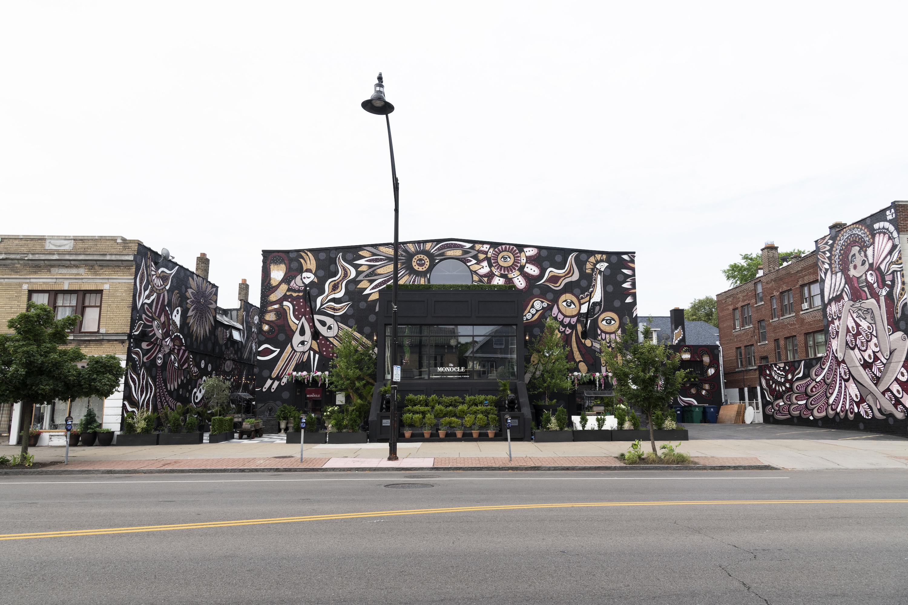 A mural wrapping around three buildings