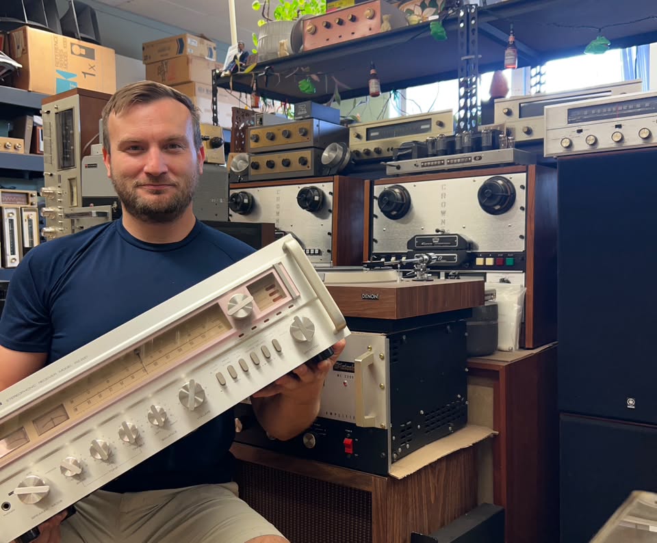 A person in an audio shop