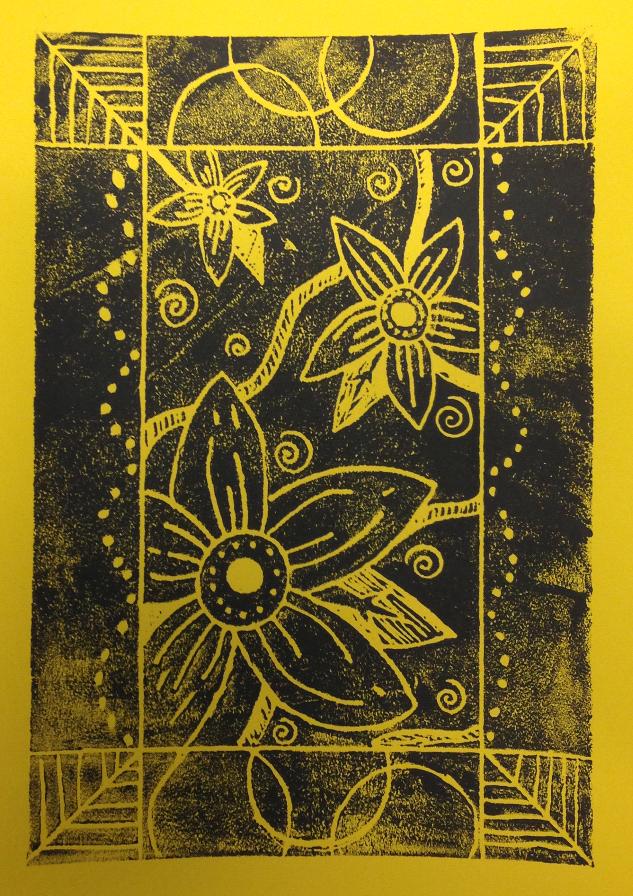 Black etching of flowers on yellow paper