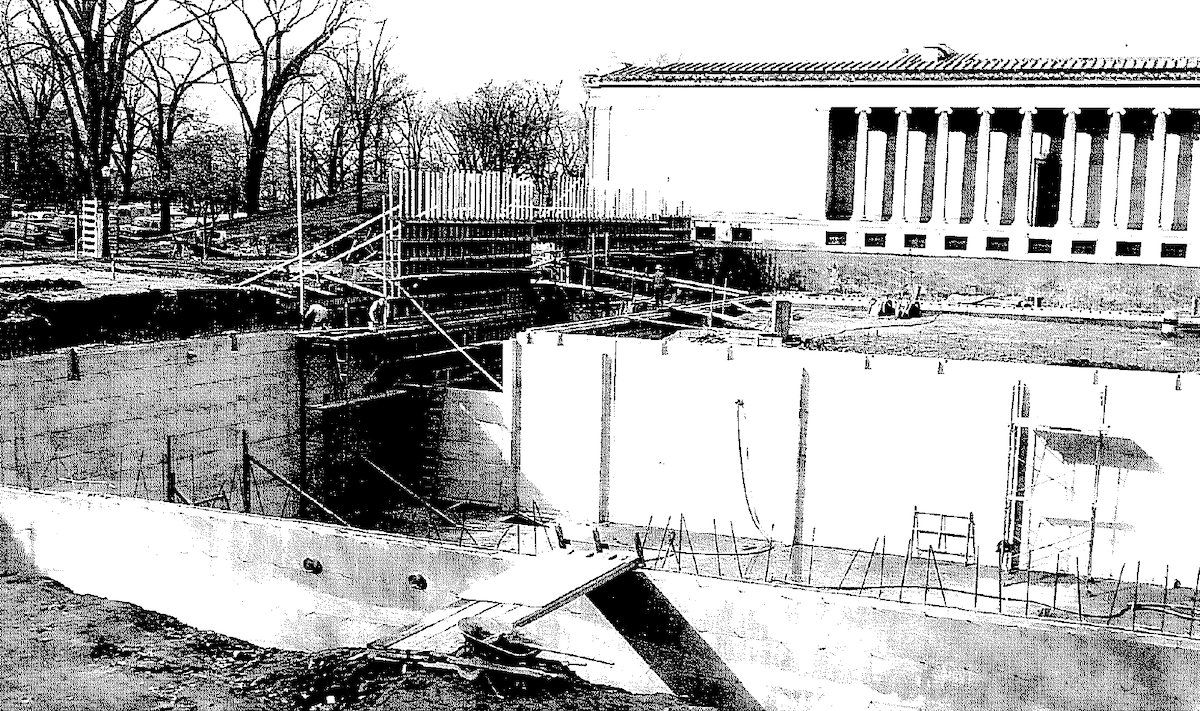 Black and whit photograph of a courtyard under construction in 1962
