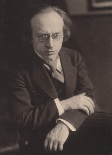 Black-and-white photograph of older white man wearing glasses