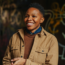 A Black man smiling