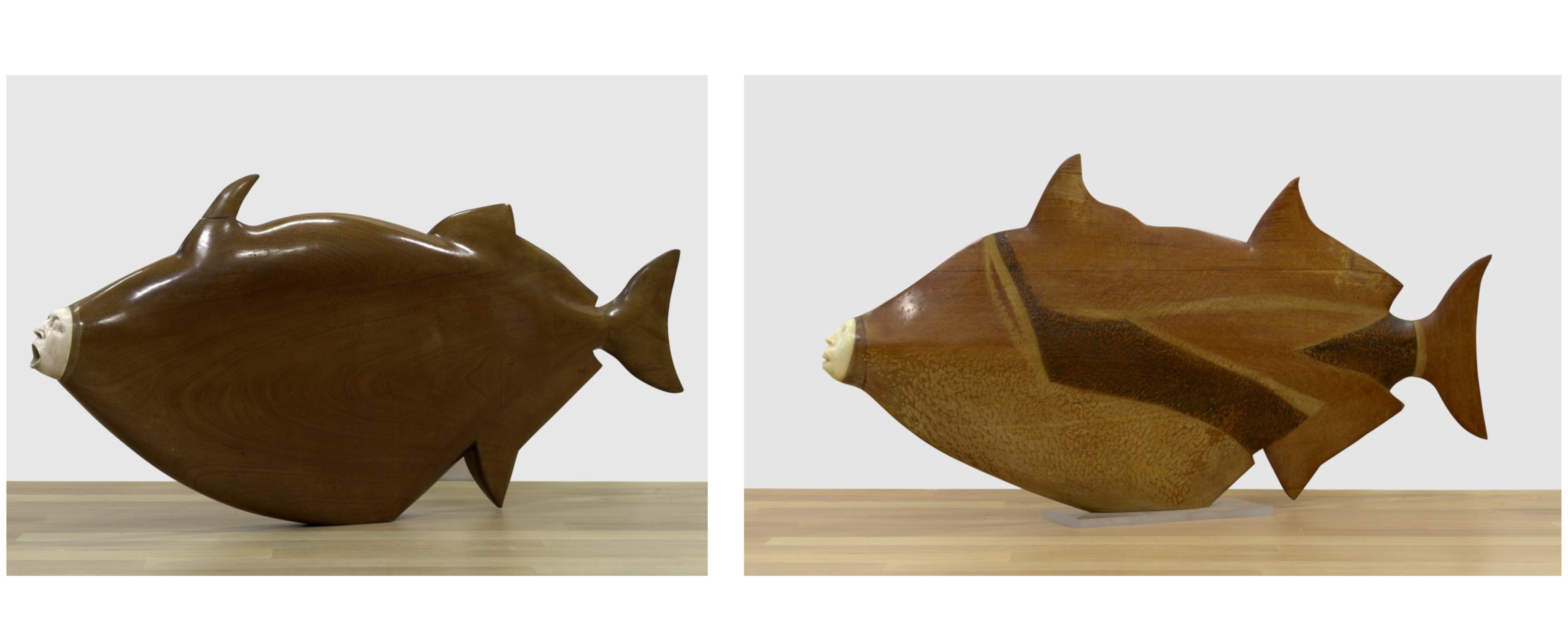 Two separate images of wooden fish sculptures with human faces 