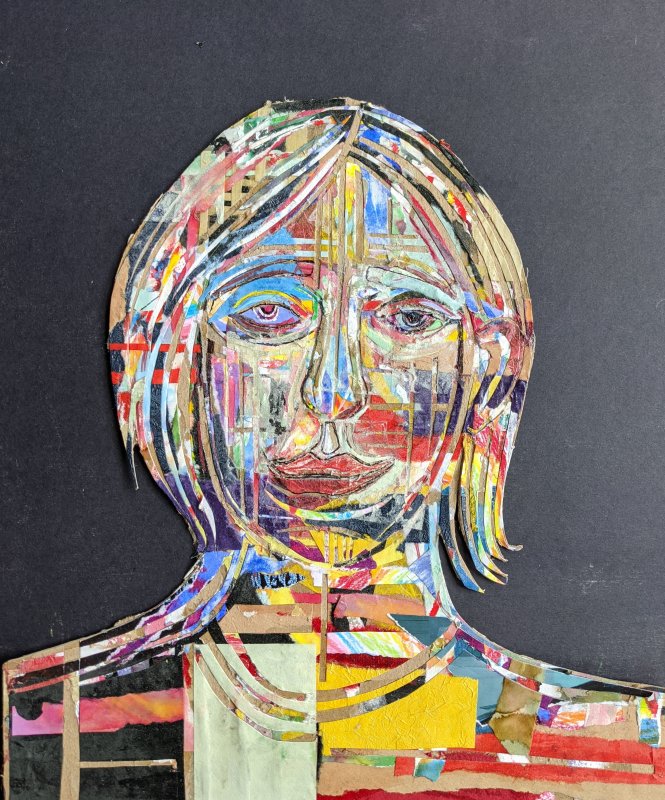A collage of a portrait made with papers and fabrics of all different colors 