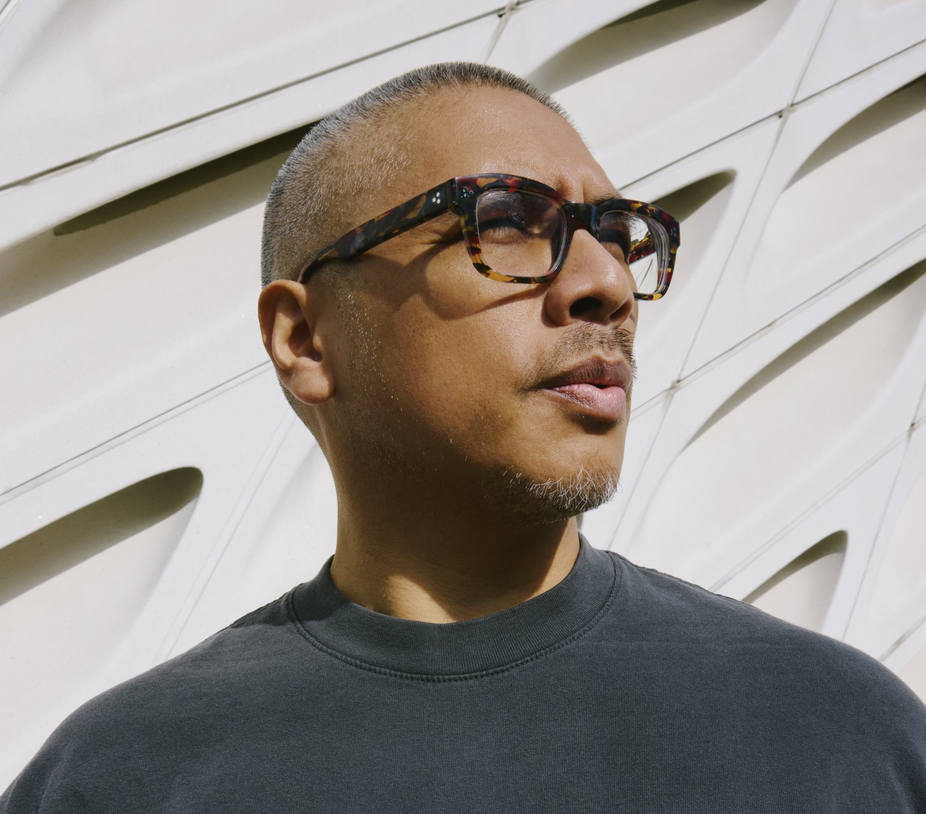 Headshot of a person looking off to the right