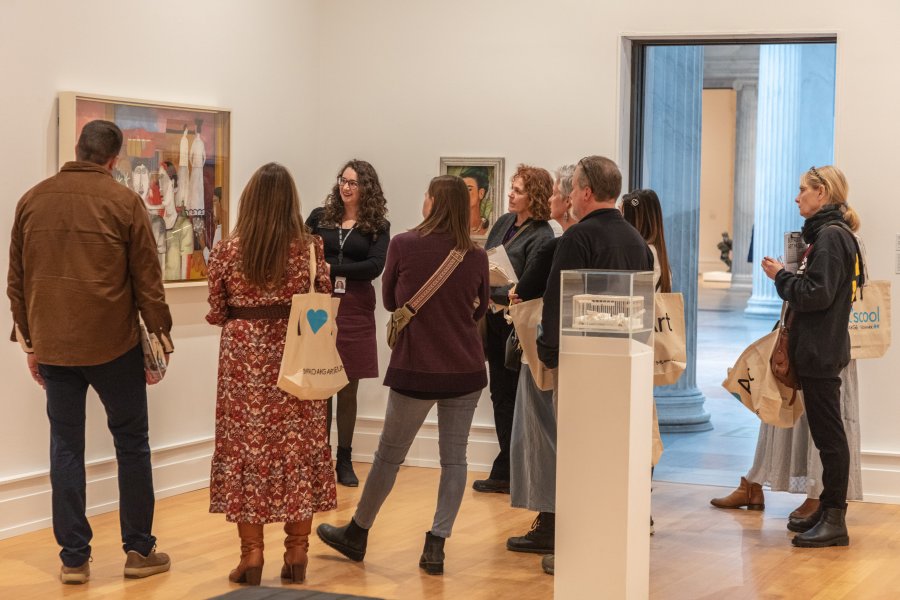 A group of educators on a tour in an art gallery