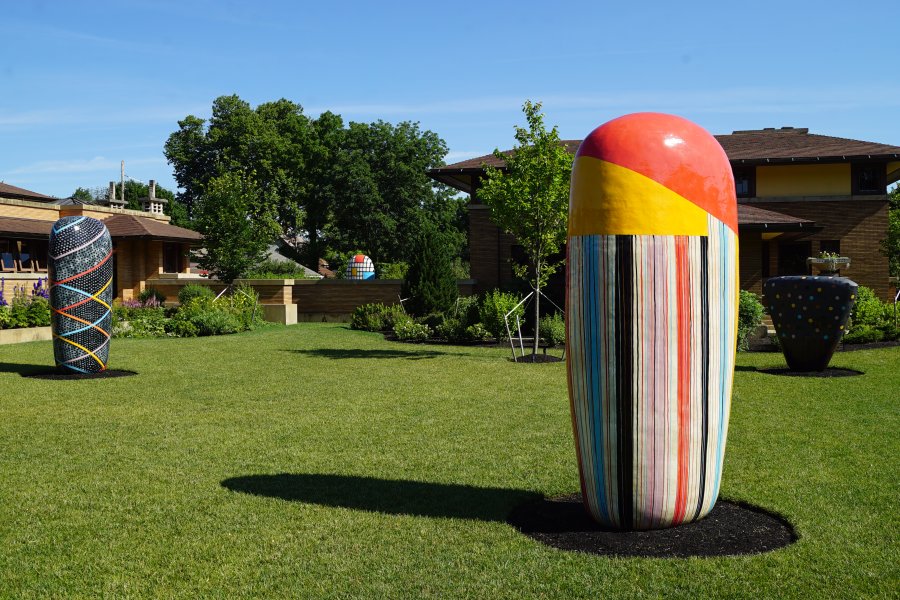 Four large ceramic sculptures on the grounds of a historic Frank Lloyd Wright-designed house