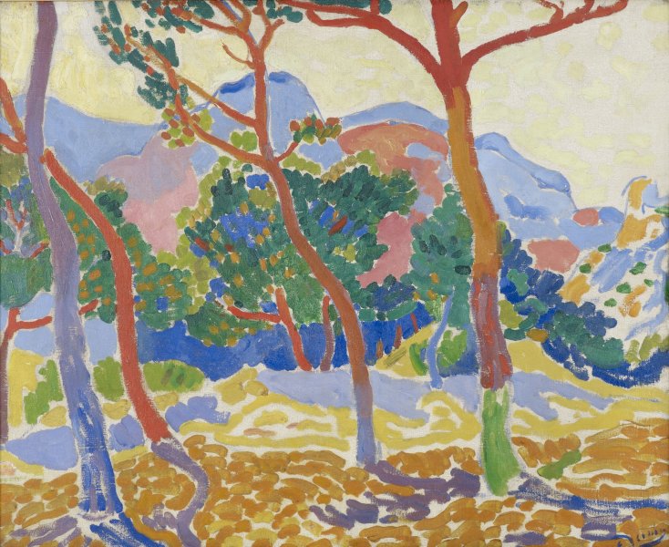 A vibrantly colored landscape with several slim-trunked trees and mountains in the background fills this canvas. The sky is a light yellow while the ground is a slightly darker, sandy hue. The artist used cool blues with patches of crimson to depict the mountains, and warm reds, yellows, and oranges to emphasize tall, thin tree trunks in the foreground. Shadows fall diagonally from the trees toward the right hand corner of the painting where the artist’s small, blue signature rests.