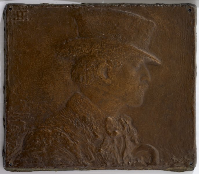 Profile Bust of a Man in a Hat Facing RIght