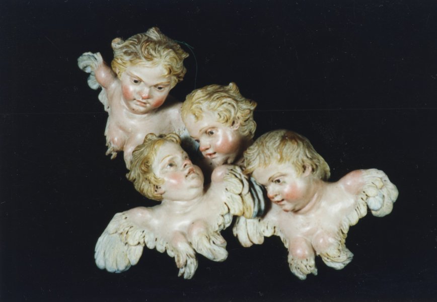 Group of Four Cherub Heads and Wings from Crèche