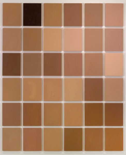 Thirty-six, portrait-oriented rectangles in monochromatic shades ranging from cool peach to warm caramel to dark brown are arranged randomly in a in a six-by-six grid.