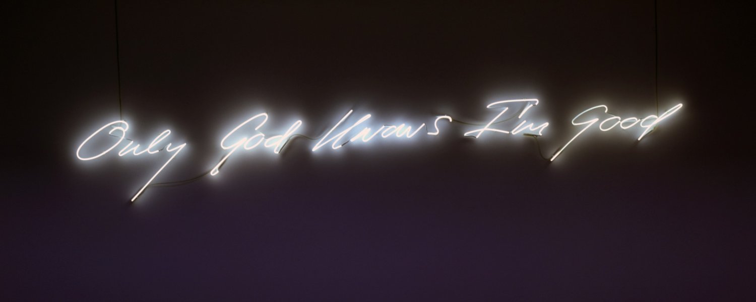 The phrase “Only God Knows I’m Good” in cursive English script is fabricated in snow white neon, which is mounted on a wall.