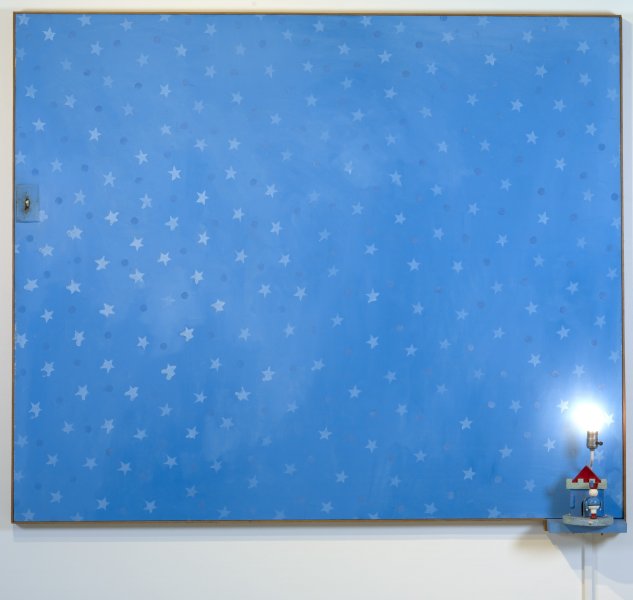 A field of hand-painted white stars alternating with dark blue dots fills the light blue background of this nearly square canvas. Attached to the bottom-right corner is a what appears to be the base of a child’s table lamp, complete with a blocky castle and toy soldier painted in solid shades of white, blue, and red beneath a shadeless, illuminated bulb. Midway up the left edge of painting is a light switch with a blue plate and worn white switch.