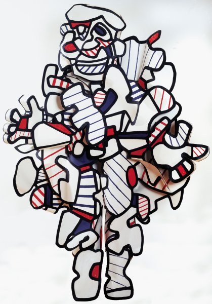 A number of small, irregularly shaped metal fragments are adhered together at various angles to form the contours of a vaguely humanoid figure. Each of these white fragments is heavily edged in black, and most of their interiors are filled with thin blue or red stripes; a small number of fragments are solid white, red, or blue. shape like a hand with three fingers and a thumb sticks out to the left side, midway down.
