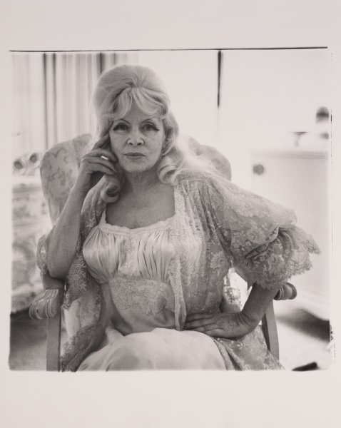 Mae West in a chair at home, Santa Monica, California