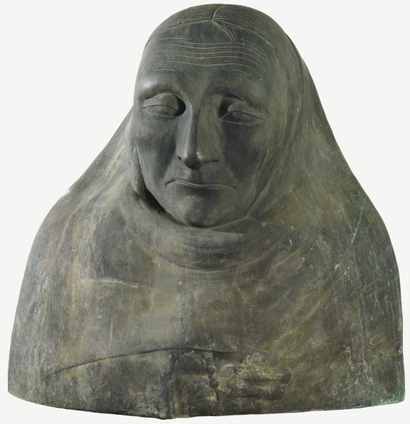 This mostly smooth surface of this bronze sculpture features the simplified facial features and shoulders of an old woman. She appears to be wrapped in a fabric garment so that only her face, the top of her head, and a portion of her right hand are visible. Beneath a lined forehead, her eyes are half open and her lips are set in a deep, weary frown.