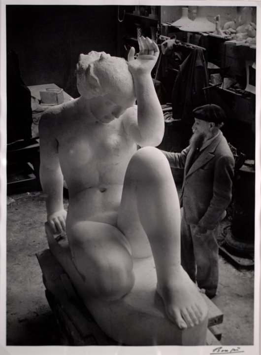 Maillol finishing his large sculpture "La Montagne" in the studio of Van Dongen Dec. 21, 1936