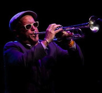 Dave Douglas playing his trumpet
