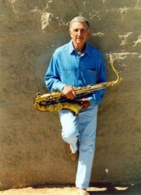 Don Rice holding his saxophone