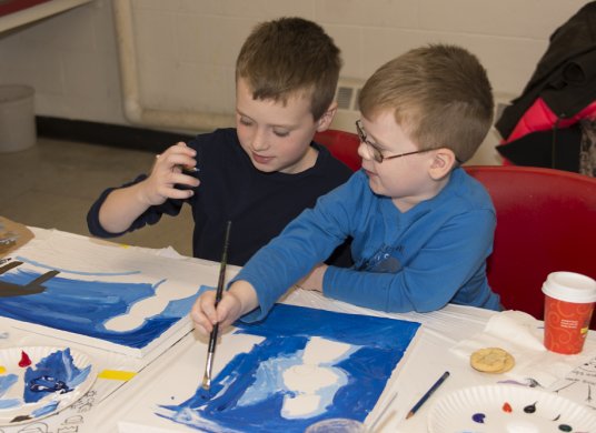 Photo of children making artwork