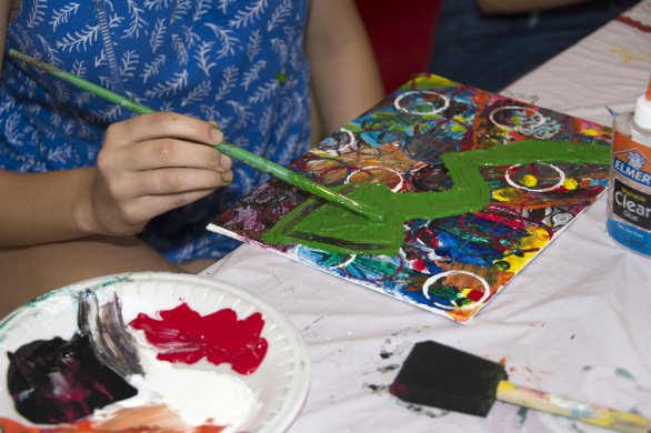 Photo of child making artwork
