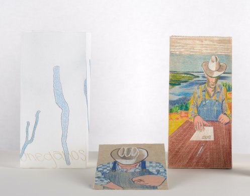 Three paintings done on paper bags, one shows a man in cowboy hat signing a "deed"