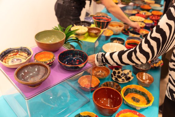 A variety of colorful bowls on a table