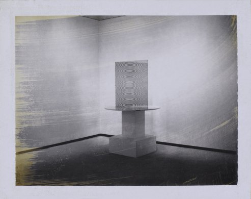 Black and white image of an Op art sculpture in a empty gallery space 