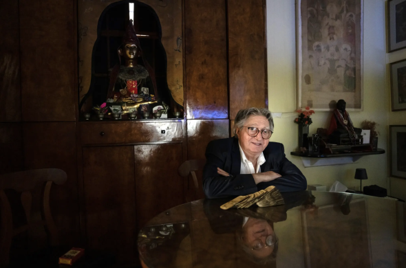 A man sitting in front of a table