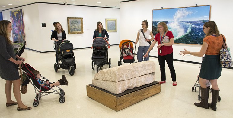 Young visitors on a stroller tour with their caregivers