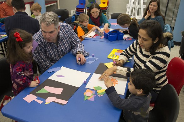 Families making art in the classroom