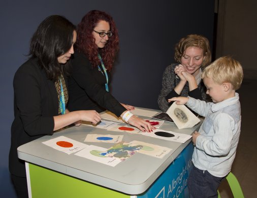 A young visitor interacts with materials on the Albright-Knox's ArtCart