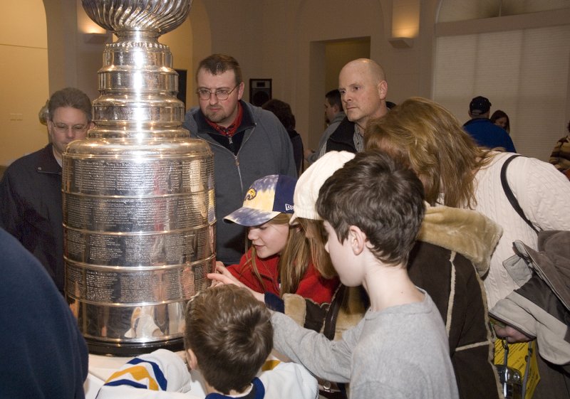 Guests touch the Stanley Cup during Hockey Night 2008