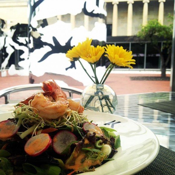 Shrimp salad artfully arranged on a table overlooking the museum's Sculpture Garden