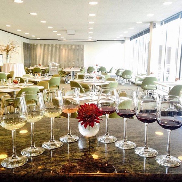 Wine glasses artfully arranged on the bar in AK Cafe