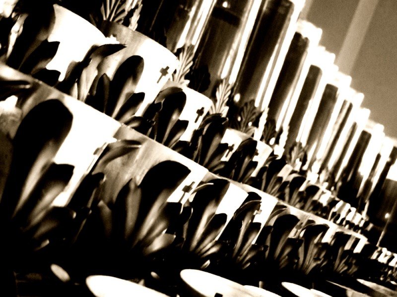 Black and white closeup photograph of church candles