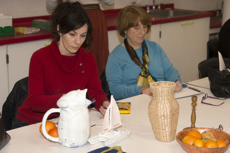 Workshop participants make still life drawings in the classrooms