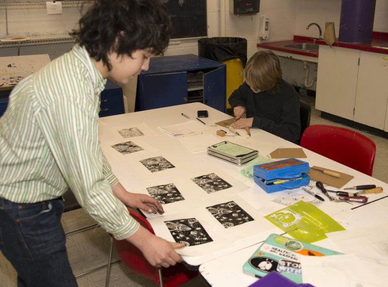 Photo of child making artwork