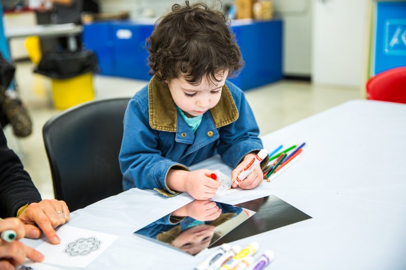 A student works on an art activity
