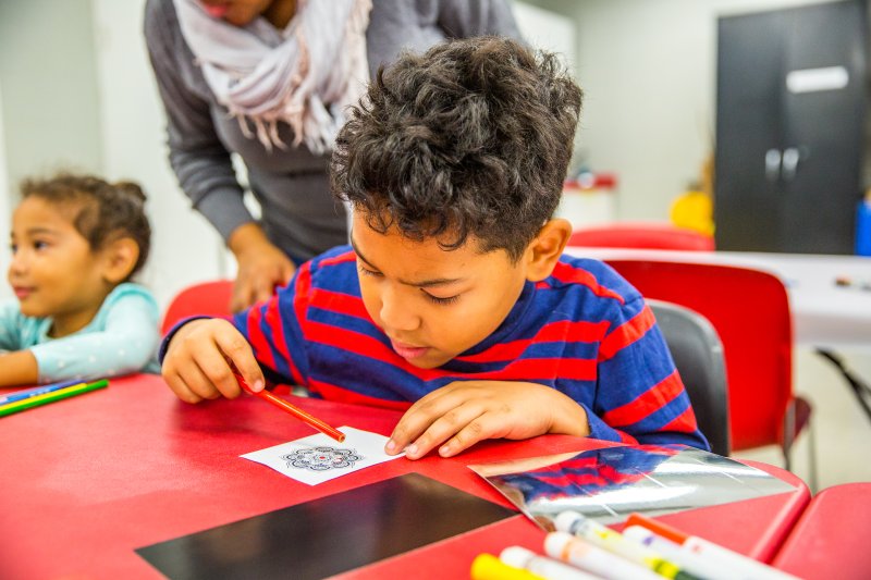 A student works on an art activity