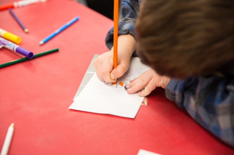 A student works on an art activity
