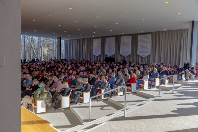 An auditorium filled with people