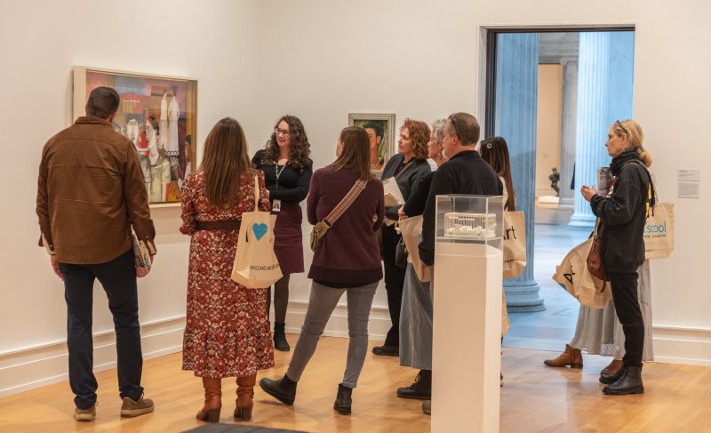 Adults touring an art gallery