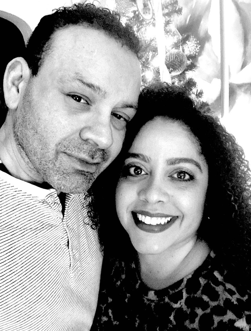 Black and white photo of a man and woman smiling