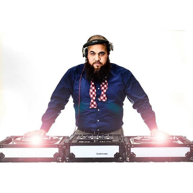 A man at a DJ booth