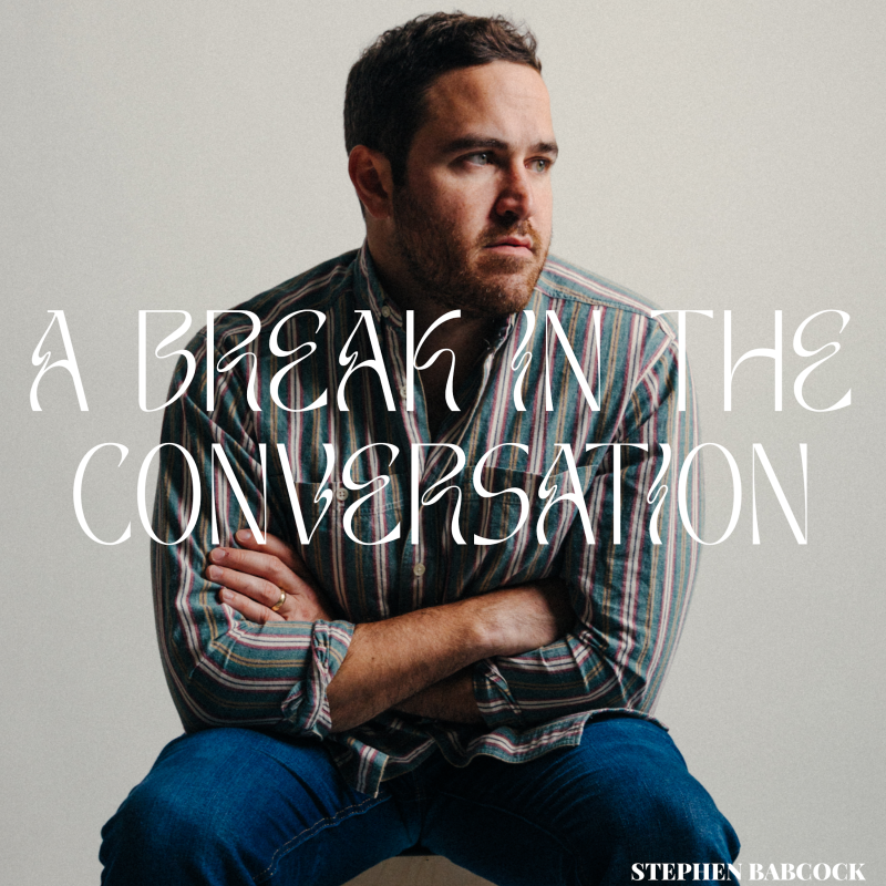 A headshot of a man looking to the side with the text "A BREAK IN THE CONVERSATION Stephen Babcock"
